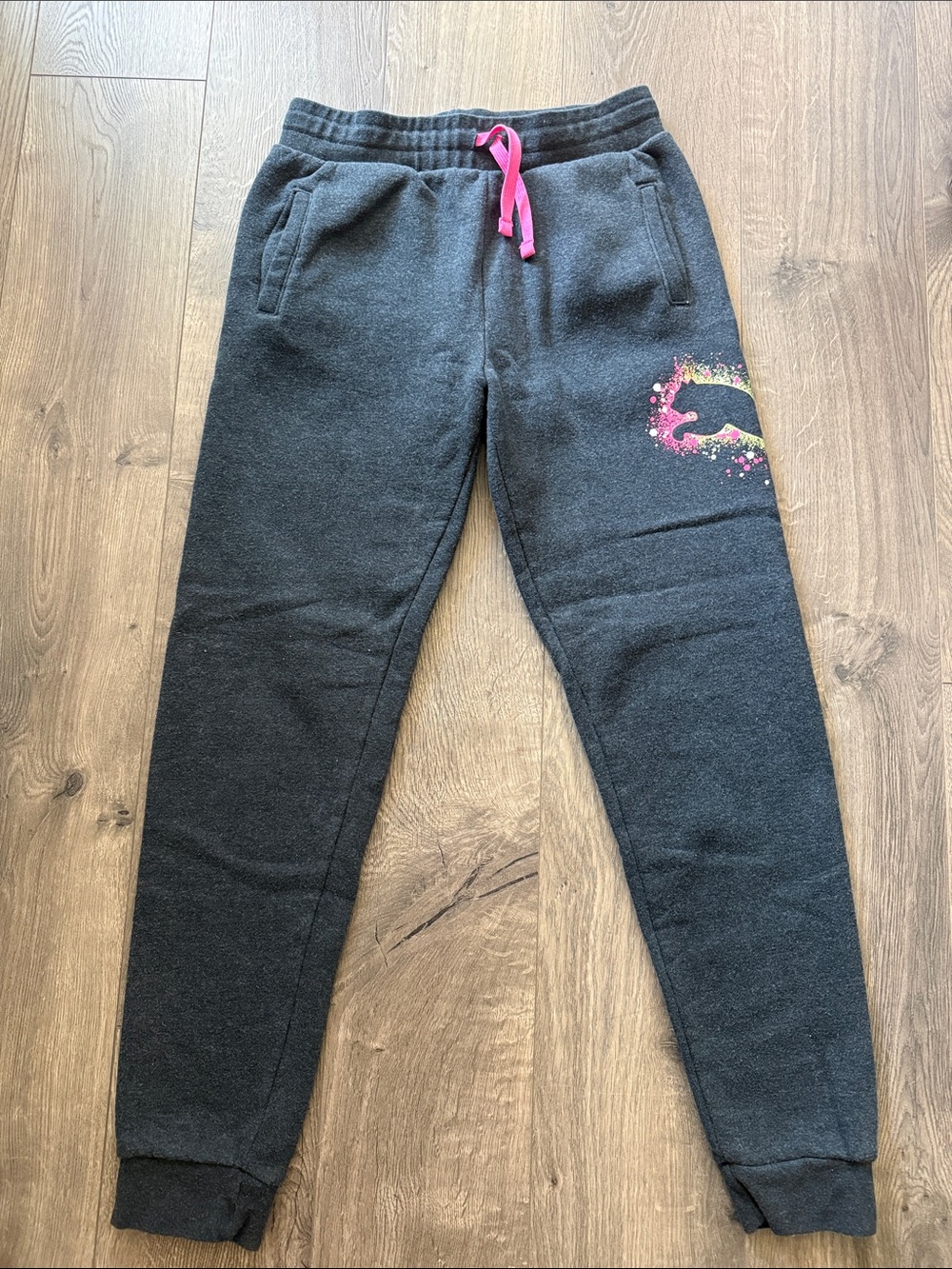 Puma Black Joggers with Pink Drawstring and Color Splash Logo